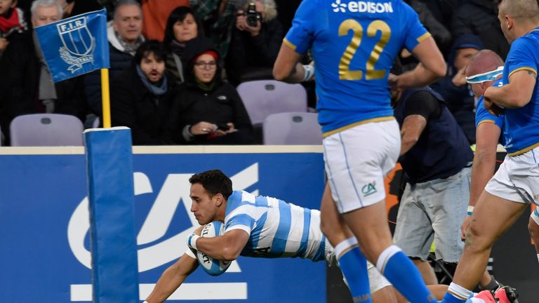 Argentina's full back Joaquin Tuculet scores a try during the International Rugby Union Test match between Italy and Argentina in Florence