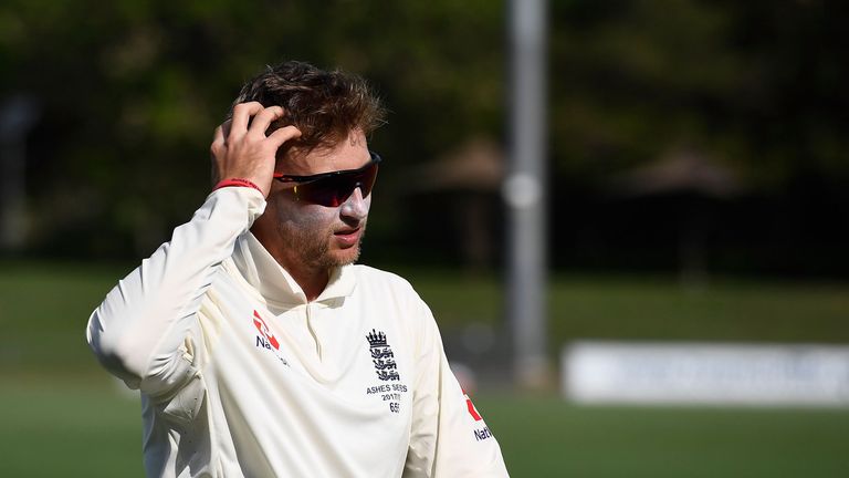 TOWNSVILLE, AUSTRALIA - NOVEMBER 18:  Joe Root of England walks from the field at the end of day 4 of the four day tour match between Cricket Australia XI 