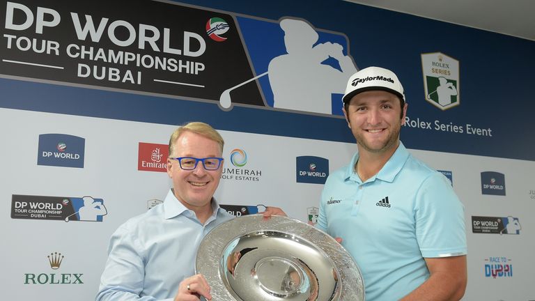 DUBAI, UNITED ARAB EMIRATES - NOVEMBER 14:  Jon Rahm of Spain is presented with the Rookie of the Year award by European Tour Chief Executive Keith Pelley 