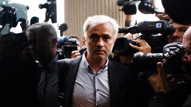 Manchester United manager Jose Mourinho enters a Madrid courthouse to answer quesions on charges of Tax fraud.