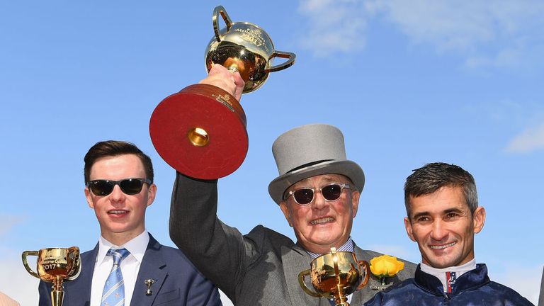 Trainer Joseph O'Brien, owner Lloyd Williams and jockey Corey Brown celebrate Rekindling's success