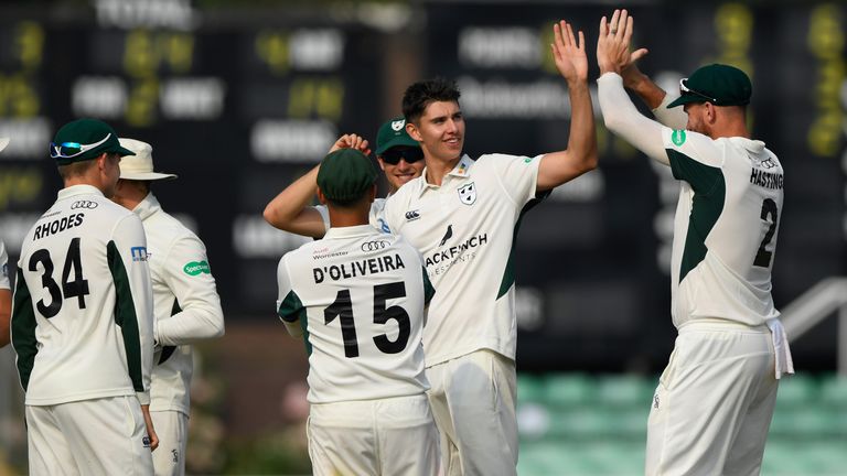 WORCESTER, ENGLAND - JUNE 20: Worcestershire bowler Josh Tongue (2nd r) is congratulated by team mates after dismissing Sam Northeast of Kent during the Sp