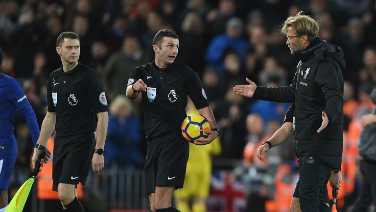 LIVERPOOL, ENGLAND - NOVEMBER 25:  Jurgen Klopp, Manager of Liverpool speaks with referee Michael Oliver after the Premier League match between Liverpool a