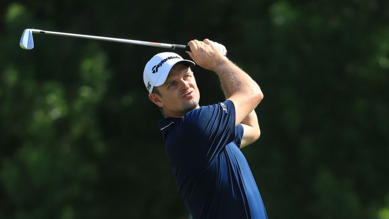 DUBAI, UNITED ARAB EMIRATES - NOVEMBER 19:  Justin Rose of England hits his second shot on the 1st hole during the final round of the DP World Tour Champio