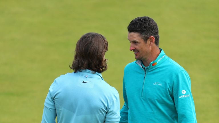 LONDONDERRY, NORTHERN IRELAND - JULY 07:  Justin Rose of England shakes hands with Tommy Fleetwood of England on the 18th green during day two of the Dubai