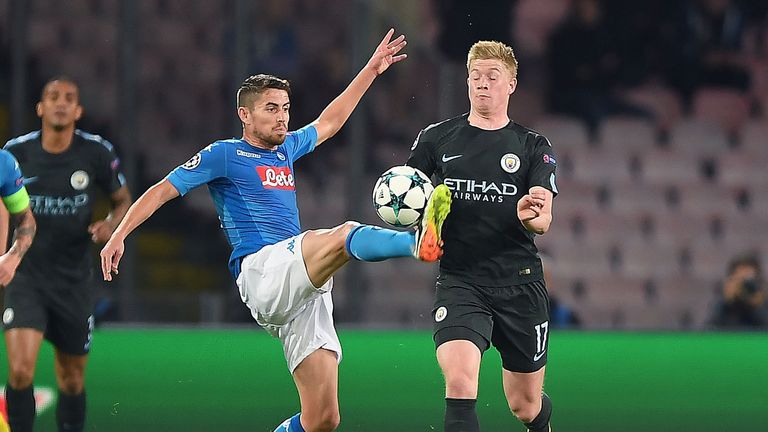 NAPLES, ITALY - NOVEMBER 01: Player of SSC Napoli Jorginho vies with Manchester City player Kevin De Bruyne during the UEFA Champions League group F match 