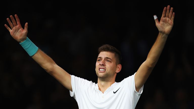 PARIS, FRANCE - NOVEMBER 04:  Filip Krajinovic of Serbia celebrates with tears in his eyes after victory against John Isner of the USA during the semi fina