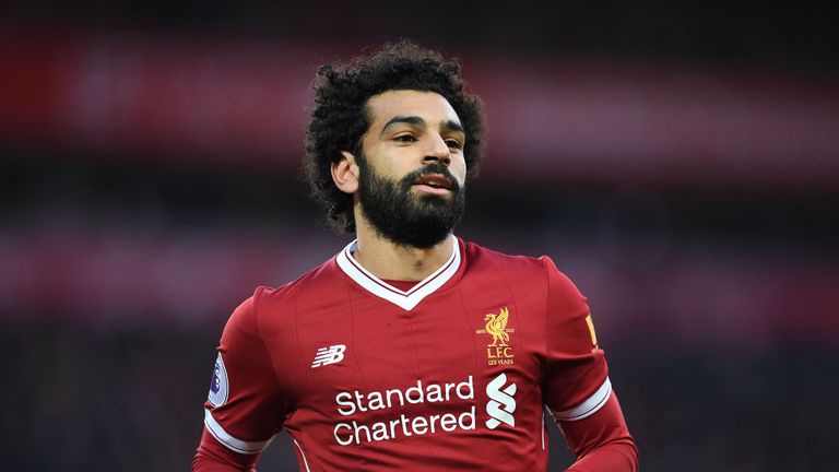 Liverpool's Egyptian midfielder Mohamed Salah celebrates scoring his team's first goal during the English Premier League football match between Liverpool a