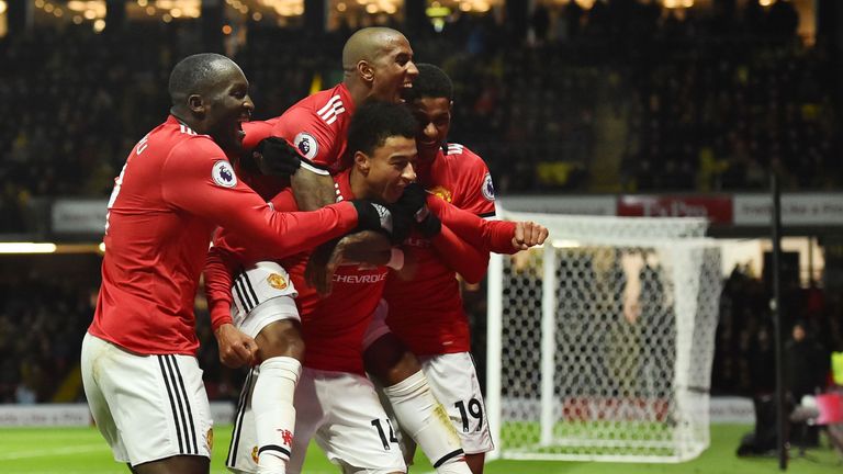 Manchester United's Jesse Lingard (C) celebrates with team-mates after scoring their fourth goal at Watford, Premier League