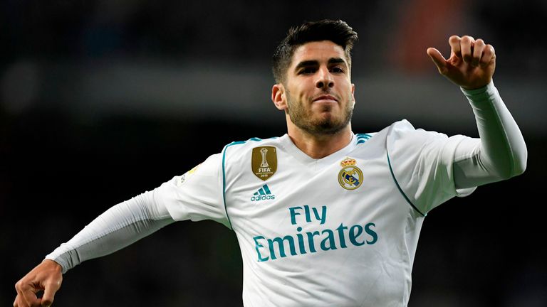 Real Madrid's Spanish midfielder Marco Asensio celebrates after scoring a goal during the Spanish league football match Real Madrid CF vs UD Las Palmas at 