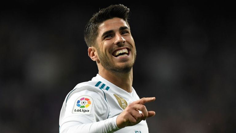 Real Madrid's Spanish midfielder Marco Asensio celebrates after scoring a goal during the Spanish league football match Real Madrid CF vs UD Las Palmas at 