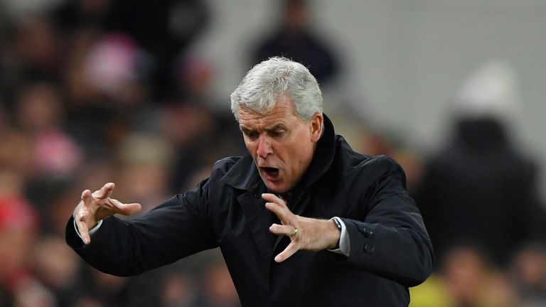 STOKE ON TRENT, ENGLAND - NOVEMBER 29:  Mark Hughes, Manager of Stoke City reacts during the Premier League match between Stoke City and Liverpool at Bet36