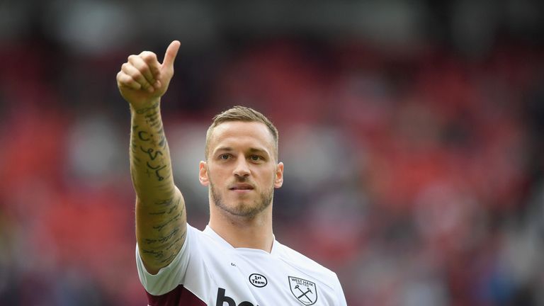 MANCHESTER, ENGLAND - AUGUST 13:  Marko Arnautovic of West Ham United shows appreciation to the fans prior to the Premier League match between Manchester U