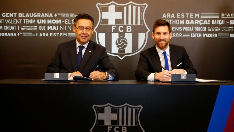 Lionel Messi signs new contract at Barcelona