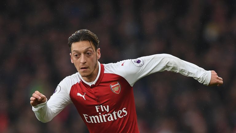 Arsene Wenger has praised Mesut Ozil's attitude in recent weeks