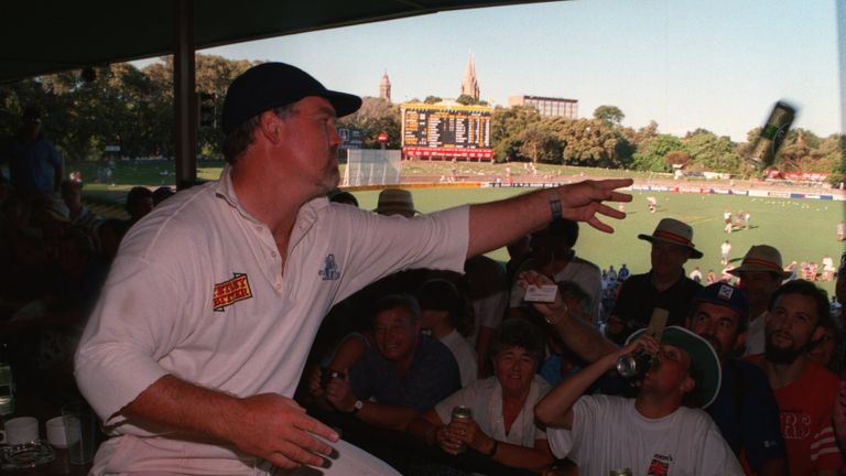 30 JAN 1995:  ENGLAND's MIKE GATTING THROWS BEER TO THE BARMY ARMY AFTER AUSTRALIA's DEFEAT ON THE FIFTH DAY OF THE FOURTH TEST MATCH IN ADELAIDE.         