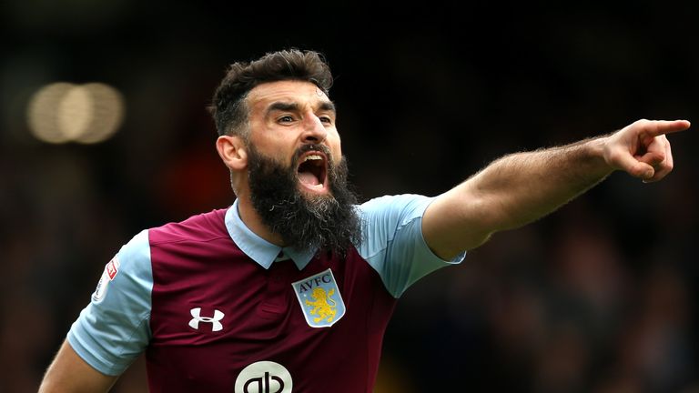 LONDON, ENGLAND - APRIL 17:  Mile Jedinak of Aston Villa instructs his team during the Sky Bet Championship match between Fulham and Aston Villa at Craven 