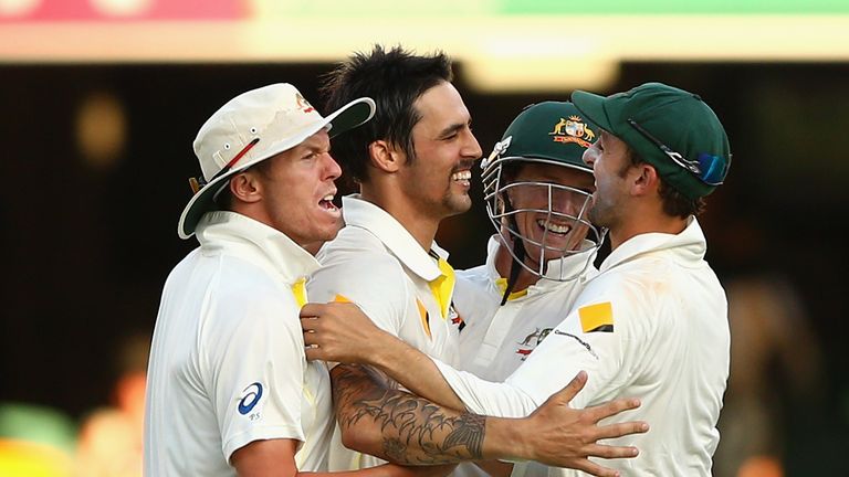 BRISBANE, AUSTRALIA - NOVEMBER 24:  Mitchell Johnson of Australia celebrates taking the wicket of James Anderson of England and winning the first test duri