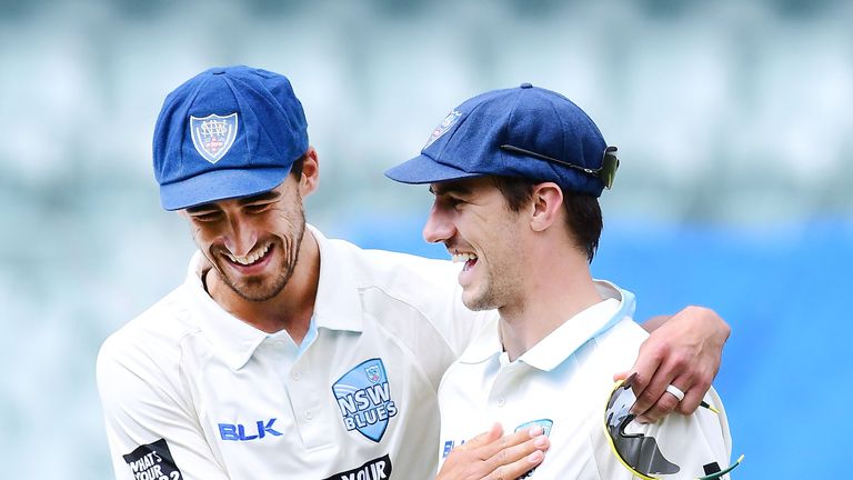 ADELAIDE, AUSTRALIA - OCTOBER 29:  NSW's MItchell Starc is congratulated on his 8th wicket by Pat Cummins during day three of the Sheffield Shield match be