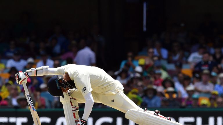 England's batsman Moeen Ali is stumped by Australia's wicketkeeper Tim Paine off the spin of bowler Nathan Lyon on the fourth day of the first cricket Ashe