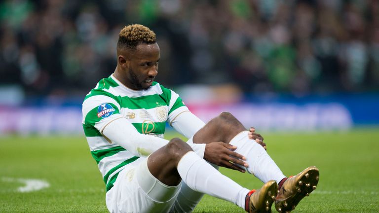 Celtic's Moussa Dembele suffers an injury against Motherwell in the League Cup final