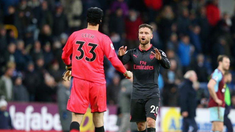 Shkodran Mustafi and Petr Cech celebrate Arsenal's win 