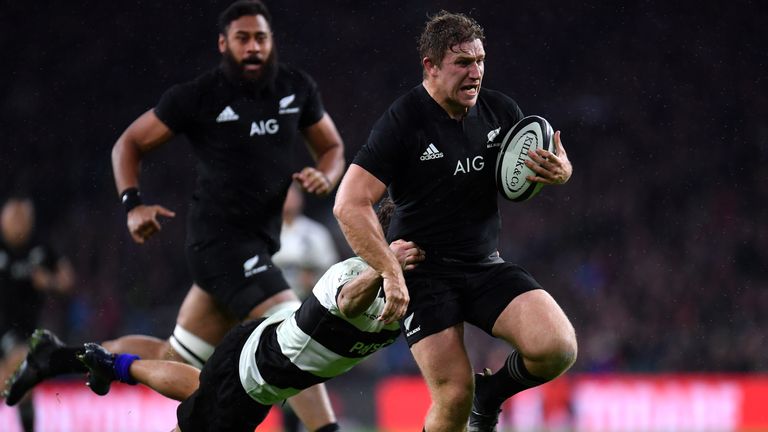 Nathan Harris of New Zealand on his way to scoring a try during the Killik Cup between Barbarians and New Zealand 