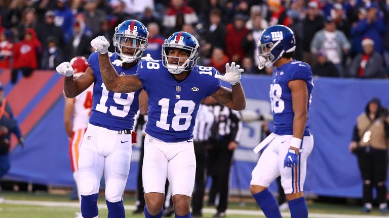 EAST RUTHERFORD, NJ - NOVEMBER 19:  Roger Lewis #18 of the New York Giants celebrates a big catch in overtime against the Kansas City Chiefs during their g