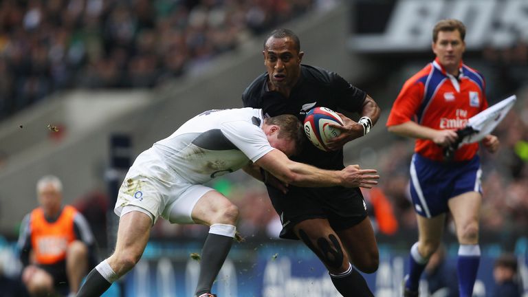 LONDON, NOVEMBER 06 2010:  Joe Rokocoko of New Zealand powers through the tackle from Chris Ashton of England during the Investec Challenge Test