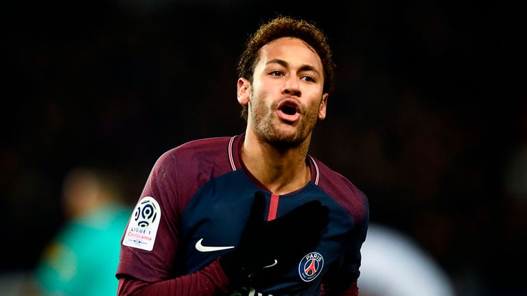 Paris Saint-Germain's Brazilian forward Neymar celebrates after scoring a goal during the French L1 football match between Paris Saint-Germain (PSG) and Tr