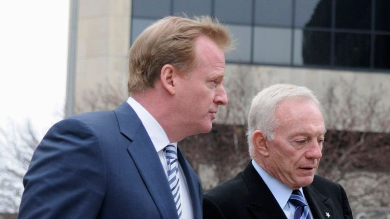 NFL Commissioner Roger Goodell (L) talks to Dallas Cowboys owner Jerry Jones
