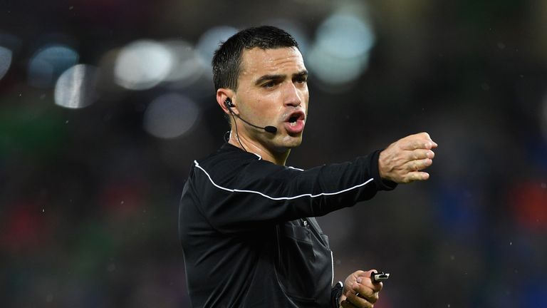 BELFAST, NORTHERN IRELAND - NOVEMBER 09:  Referee, Ovidiu Hategan makes a decision during the FIFA 2018 World Cup Qualifier Play-Off: First Leg between Nor