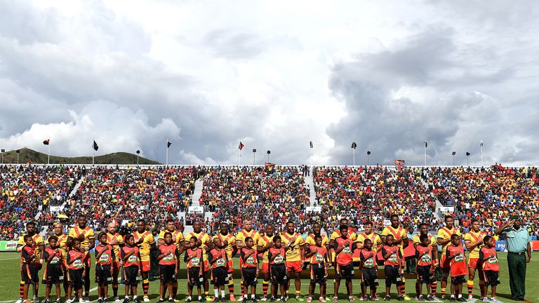 Papua New Guinea embrace for their national anthem in front of a passionate home support in Port Moresby