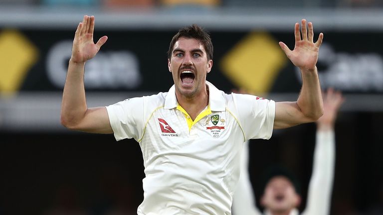 BRISBANE, AUSTRALIA - NOVEMBER 23:  Pat Cummins of Australia appeals for the wicket of Joe Root of England during day one of the First Test Match of the 20