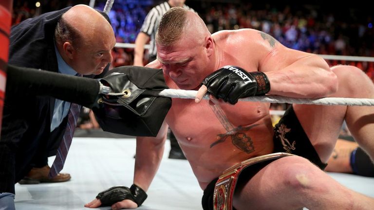 Lesnar takes post-match advice from his advocate, Heyman