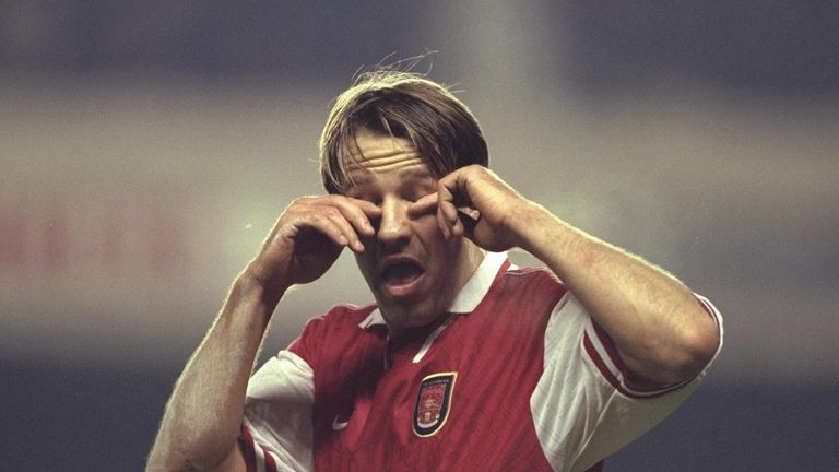 8 Dec 1996:  Paul Merson of Arsenal rubs his eyes, during the FA Carling Premier league match between Arsenal and Derby County at Highbury in London. The m
