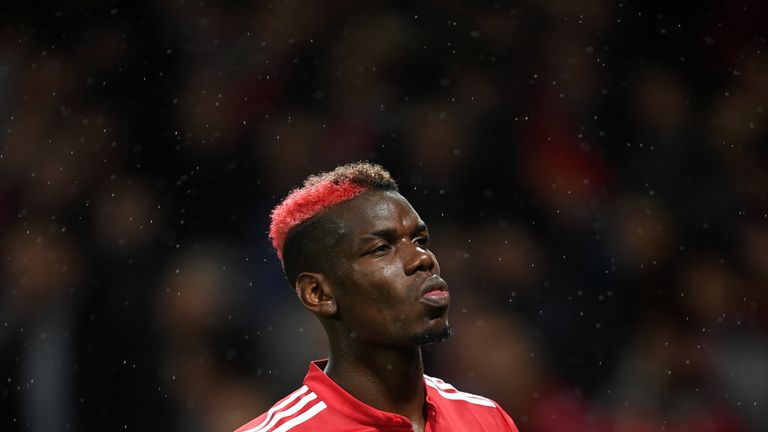 Paul Pogba walks off injured during the UEFA Champions League group A match between Manchester United and FC Basel