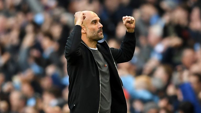 MANCHESTER, ENGLAND - NOVEMBER 05: Josep Guardiola, Manager of Manchester City celebrates his sides first goal during the Premier League match between Manc