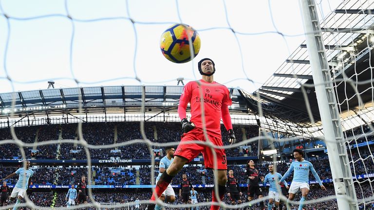 MANCHESTER, ENGLAND - NOVEMBER 05: Petr Cech of Arsenal reacts to conceding a penalty from Sergio Aguero of Manchester City (obscure) during the Premier Le