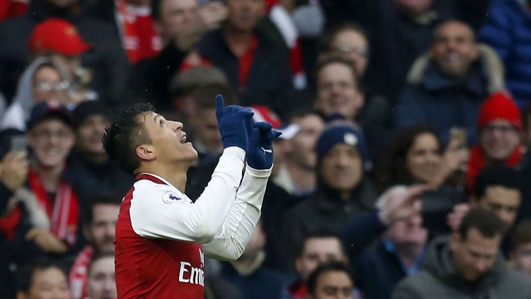 Alexis Sanchez celebrates scoring Arsenal's second goal against Spurs
