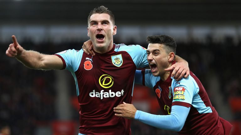 Sam Vokes celebrates his winning goal with team-mate Matthew Lowton