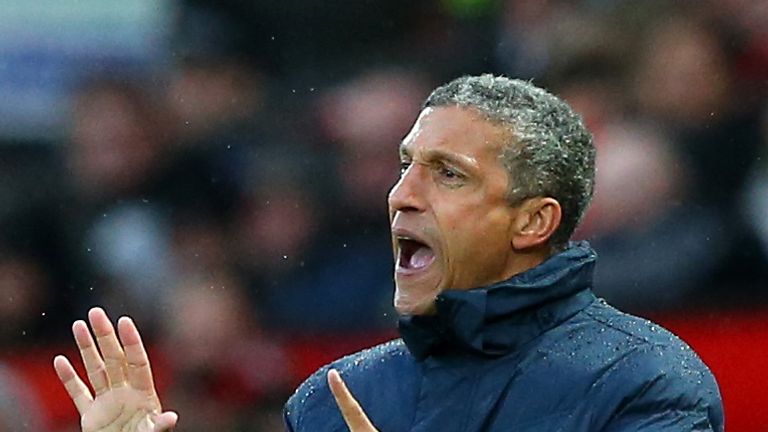 Chris Hughton shouts instructions to his players from the sideline at Old Trafford