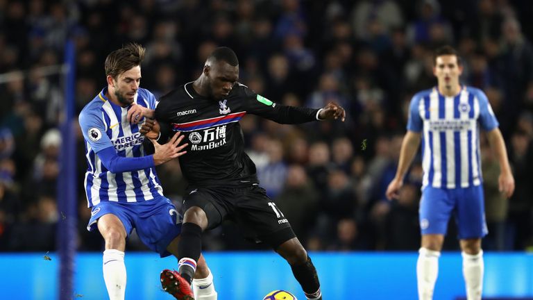 Christian Benteke holds off the challenge of Davy Propper at the Amex Stadium