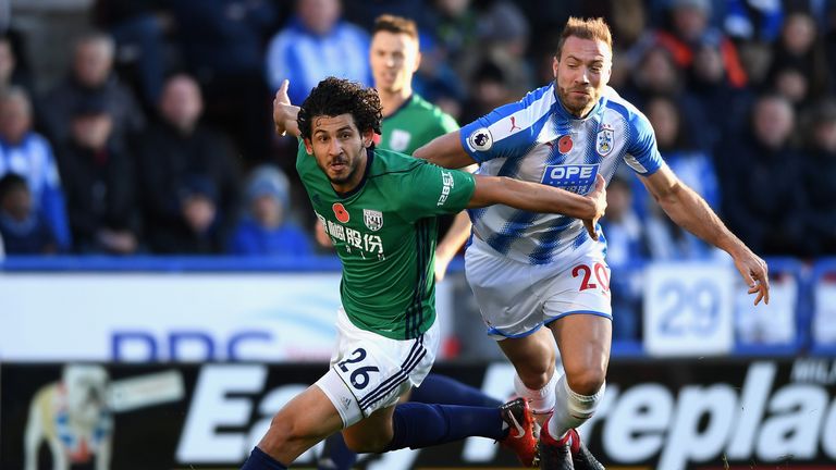 Ahmed El-Sayed Hegazi and Laurent Depoitre in action at John Smith's Stadium