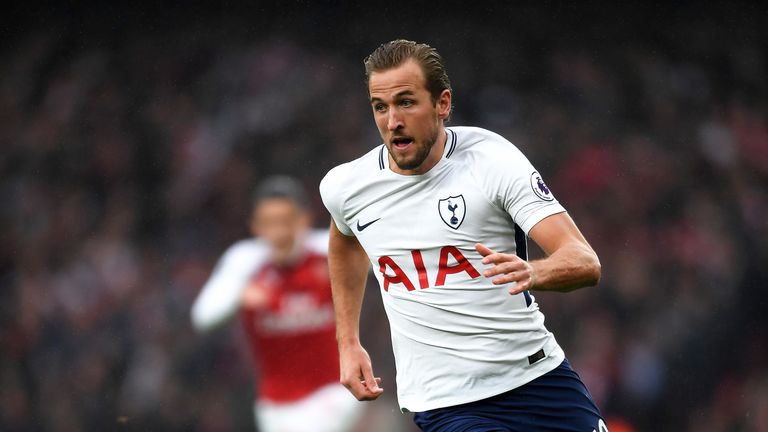 Harry Kane surges forward during the Premier League match between Arsenal and Tottenham at the Emirates