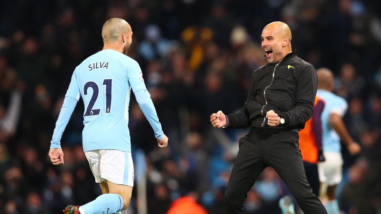 Pep Guardiola and David Silva celebrate the 2-1 victory over Southampton