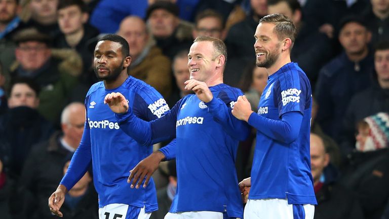 Wayne Rooney celebrates his second goal with Cuco Martina and Gylfi Sigurdsson