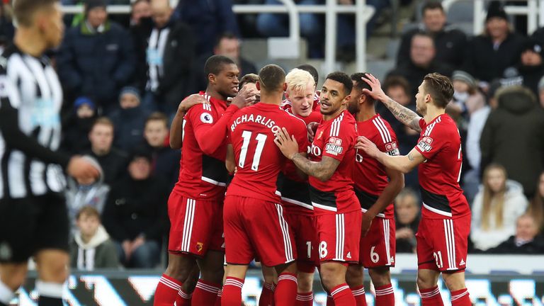 Will Hughes celebrates with his Watford team-mates after giving them a 1-0 lead