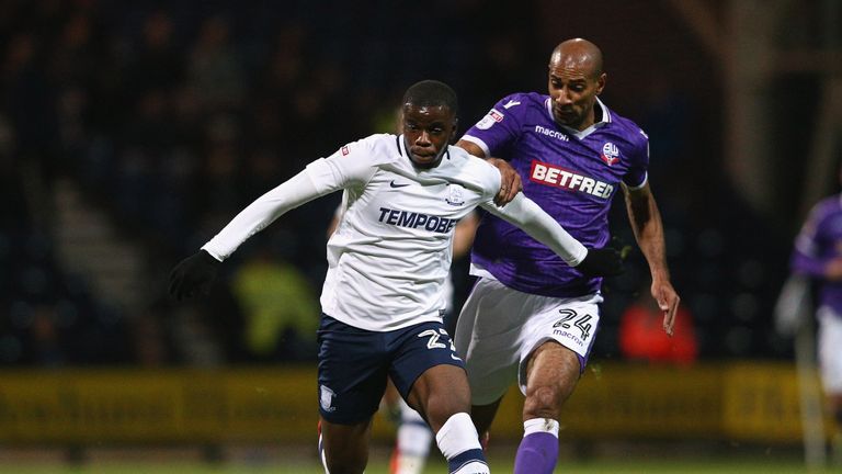 Stephy Mavididi of Preston North End holds off a challenge from Karl Henry of Bolton Wanderers during the Sky Bet Championship