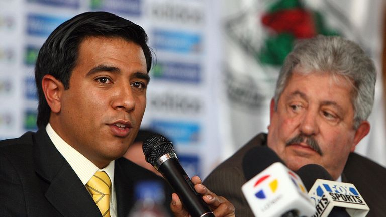 Venezuela's new national team manager, Cesar Farias (L), along with the president of the Venezuelan Football Federation, Rafael Esquivel, speaks at a press
